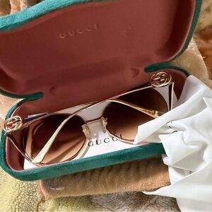 Gucci Women's Sunglasses with Gold Frame
